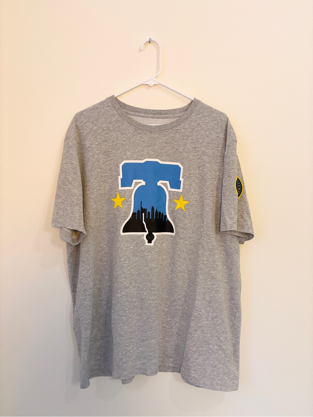 New Era Gray Tee with Blue Liberty Bell and Yellow Stars